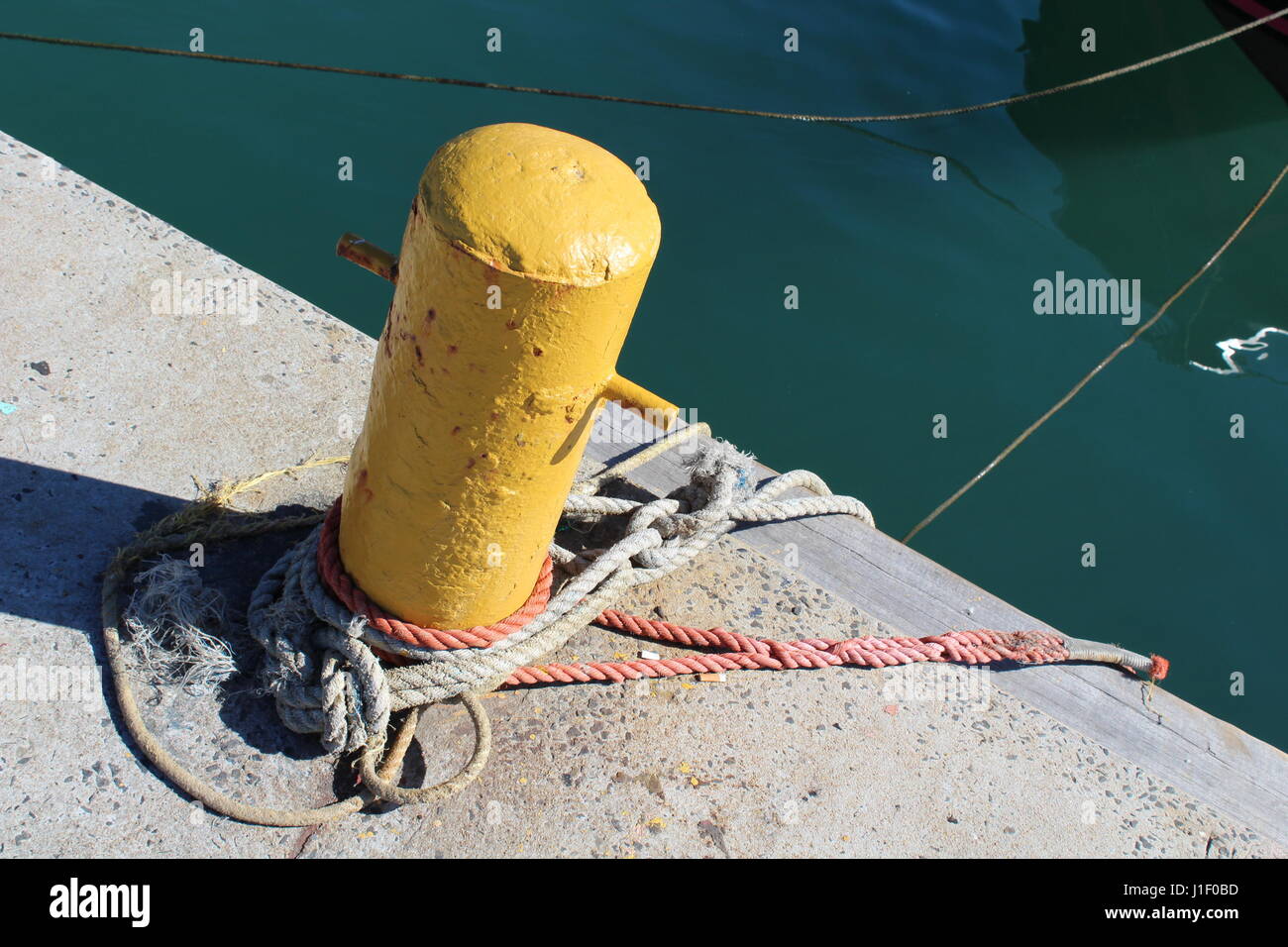 Mooring at Kalk Bay harbour, Cape Town, South Africa Stock Photo