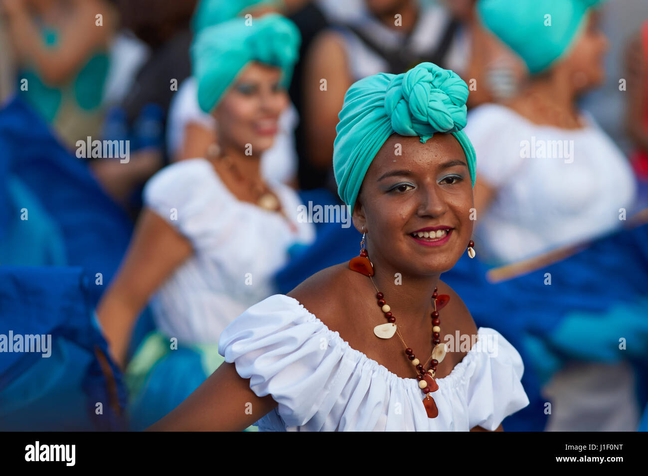 Group of dancers of Africa descent (Afrodescendiente) performing at the annual Carnaval Andino con la Fuerza del Sol in Arica, Chile. Stock Photo