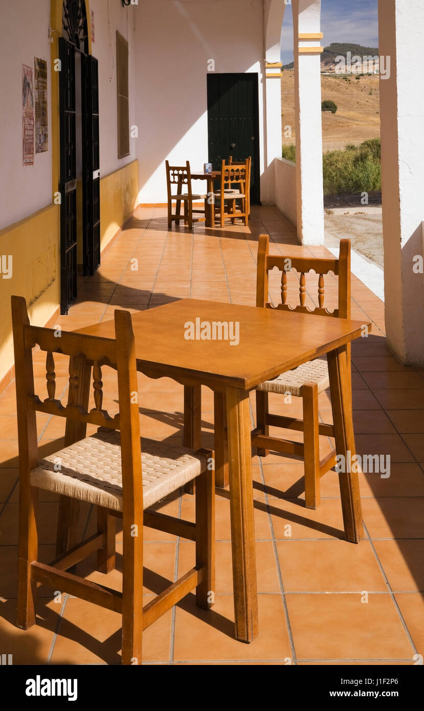 Wooden tables and chairs on a terrace, Ronda, Spain, Europe Stock Photo