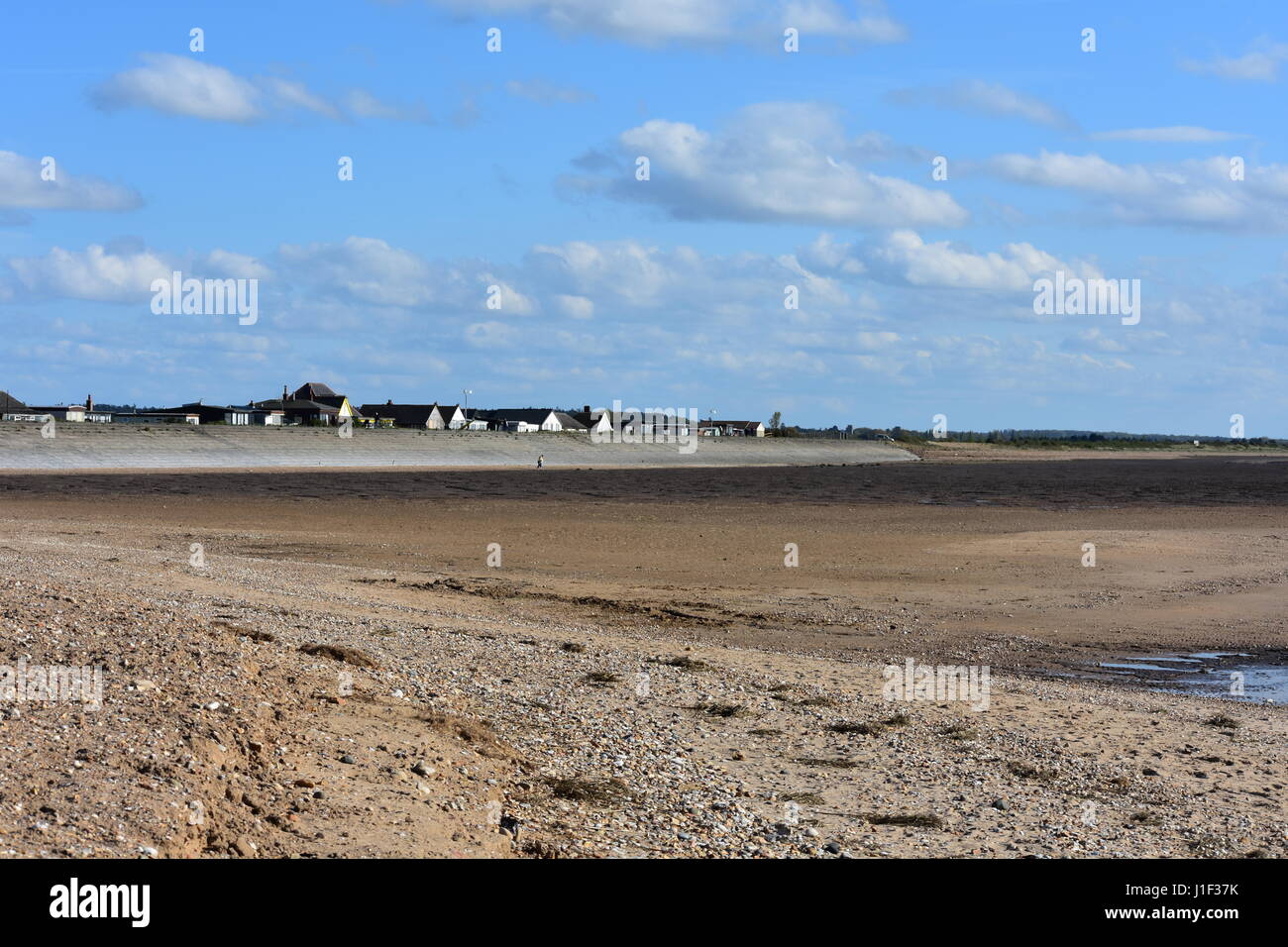 Beach Chalets and Sea Defense at Low Tide,