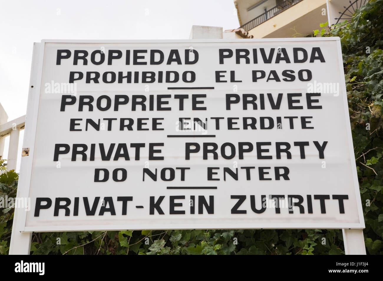 Close-up of Private Property Do Not Enter warning sign in front of an apartment building, Torremolinos, Costal del Sol, Spain, Europe Stock Photo
