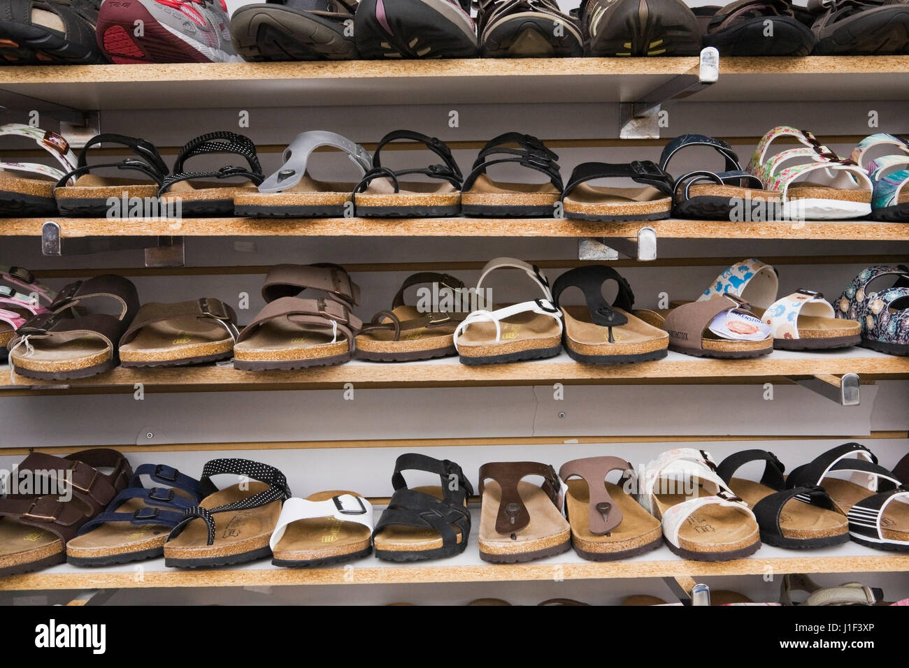 Display shelves with woman's summer sandals for sale, Byward Market, Ottawa, Ontario, Canada Stock Photo