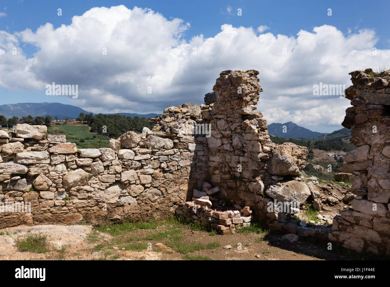 Ancient Half Ruined Walls With Mountain View In Antiochia Ad Cragum Stock Photo Alamy