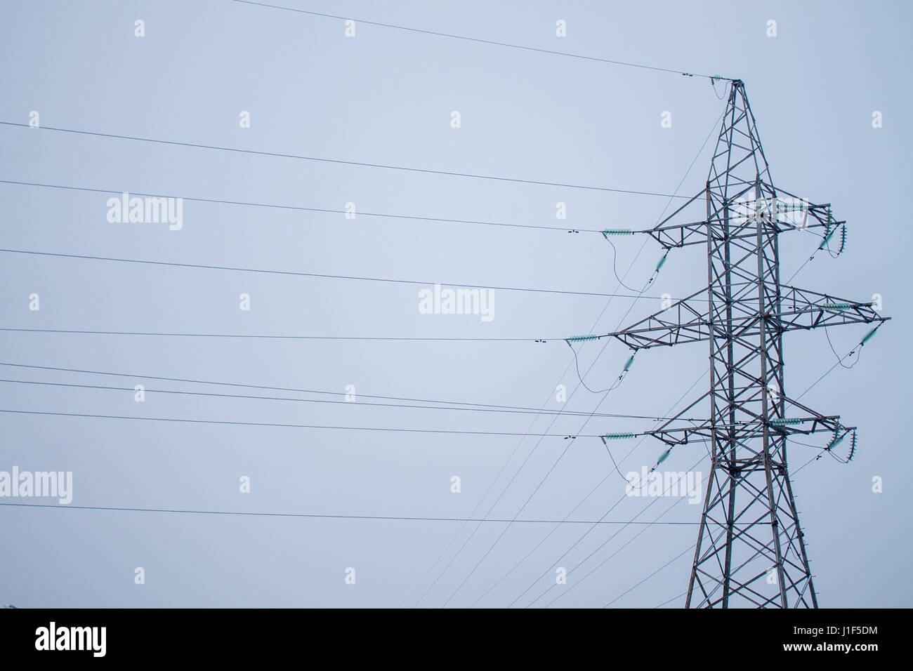 High voltage electric tower elements with sky background Stock Photo