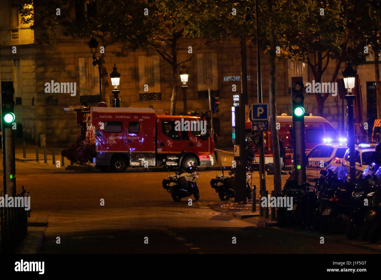 Paris, France. 20th Apr, 2017. Communication and control vehicles from the Paris Fire brigade are parked in the Champs-Elysees. The Champs-Elysées avenue in Paris has been closed off by Police after an terror attack that cost the life of one Police officer. Credit: Michael Debets/Pacific Press/Alamy Live News Stock Photo