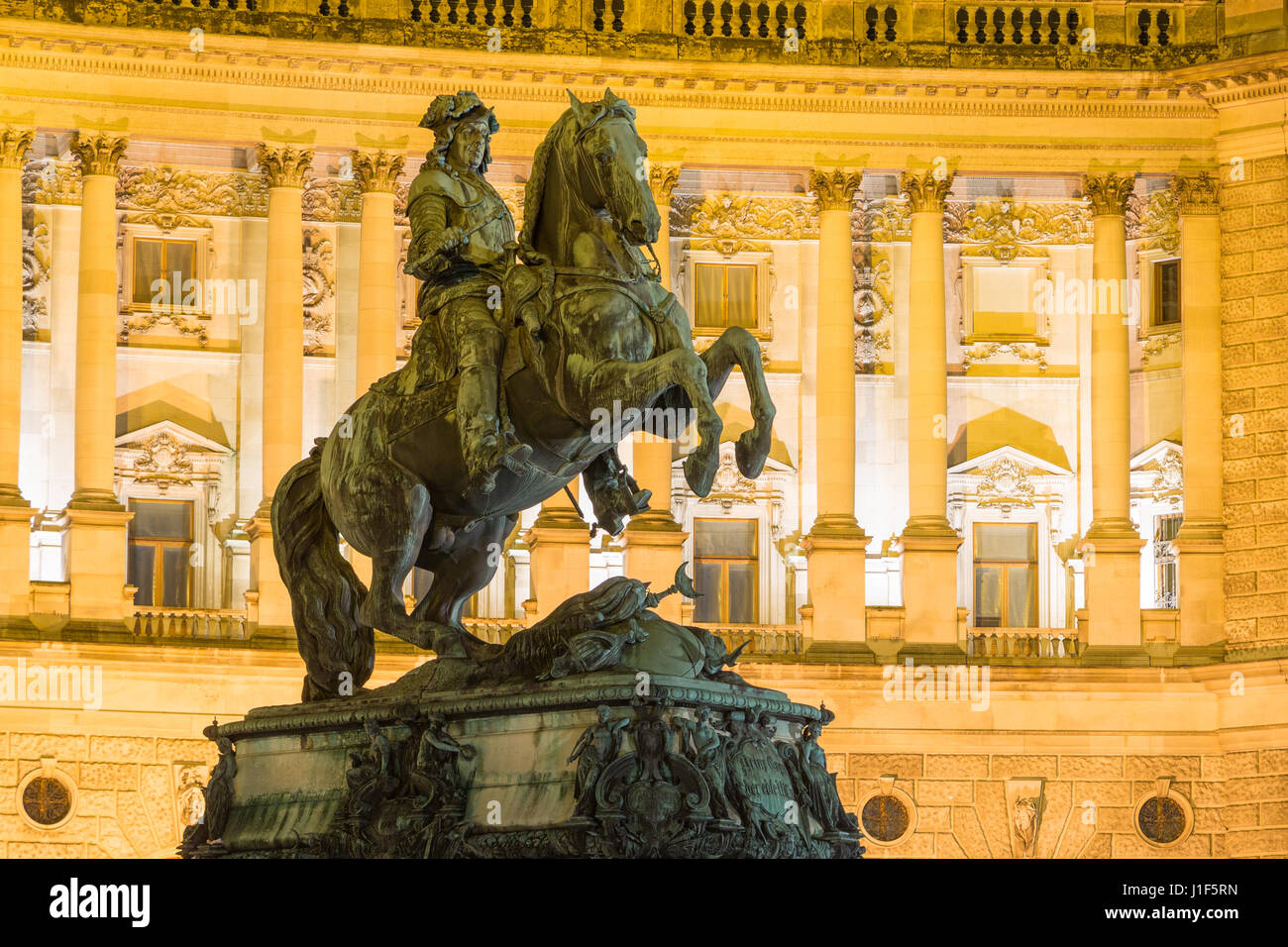 Equestrian sculpture Prinz Eugen in front of Neue Burg, Hofburg Imperial Palace by night, Vienna, Austria Stock Photo