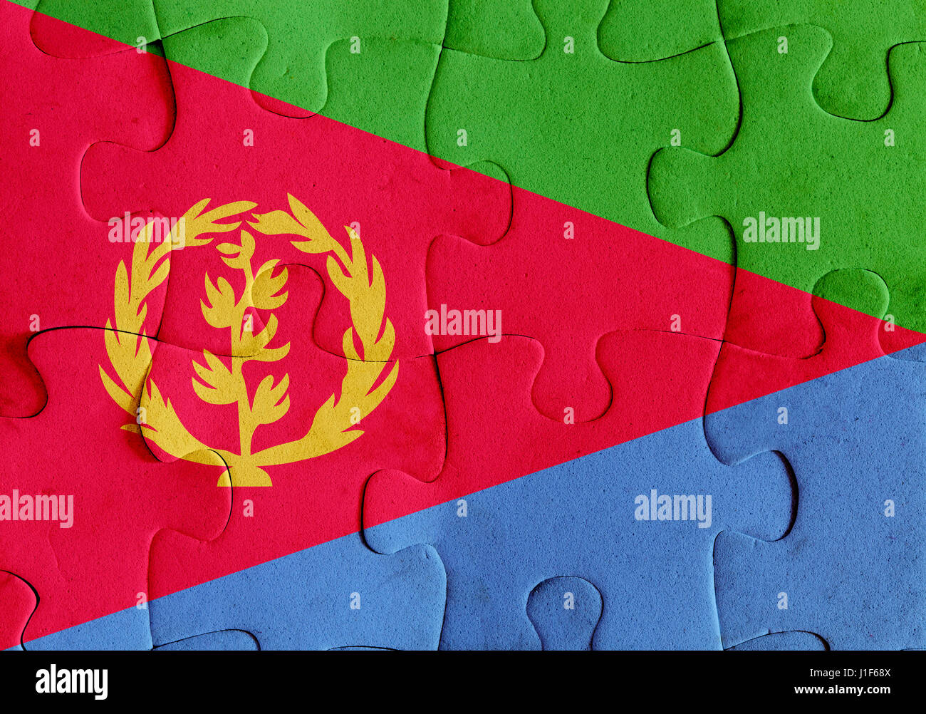 Illustration of a flag of Eritrea over some puzzle pieces. Its a JPG ...