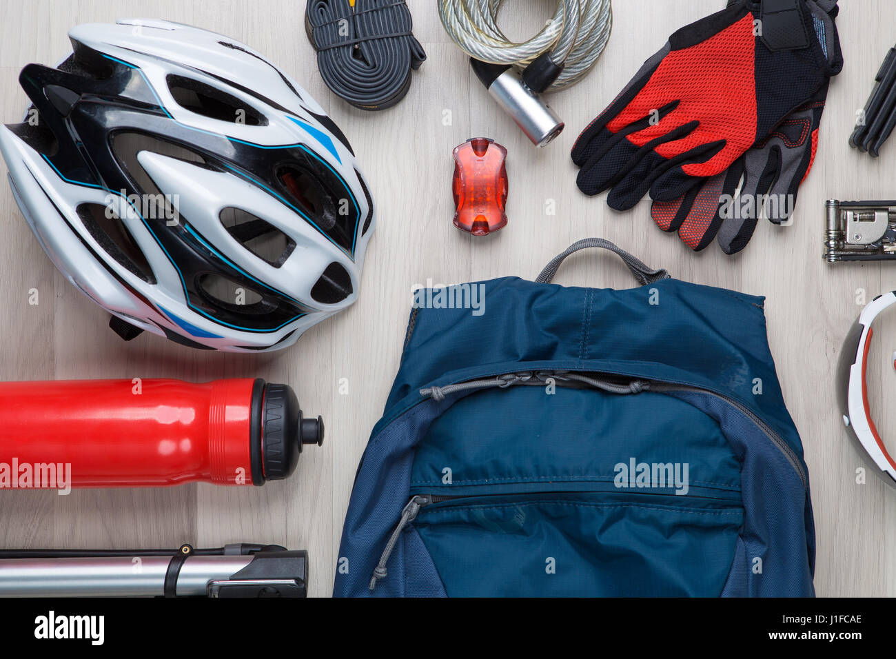 Cyclist accessories on empty background Stock Photo Alamy