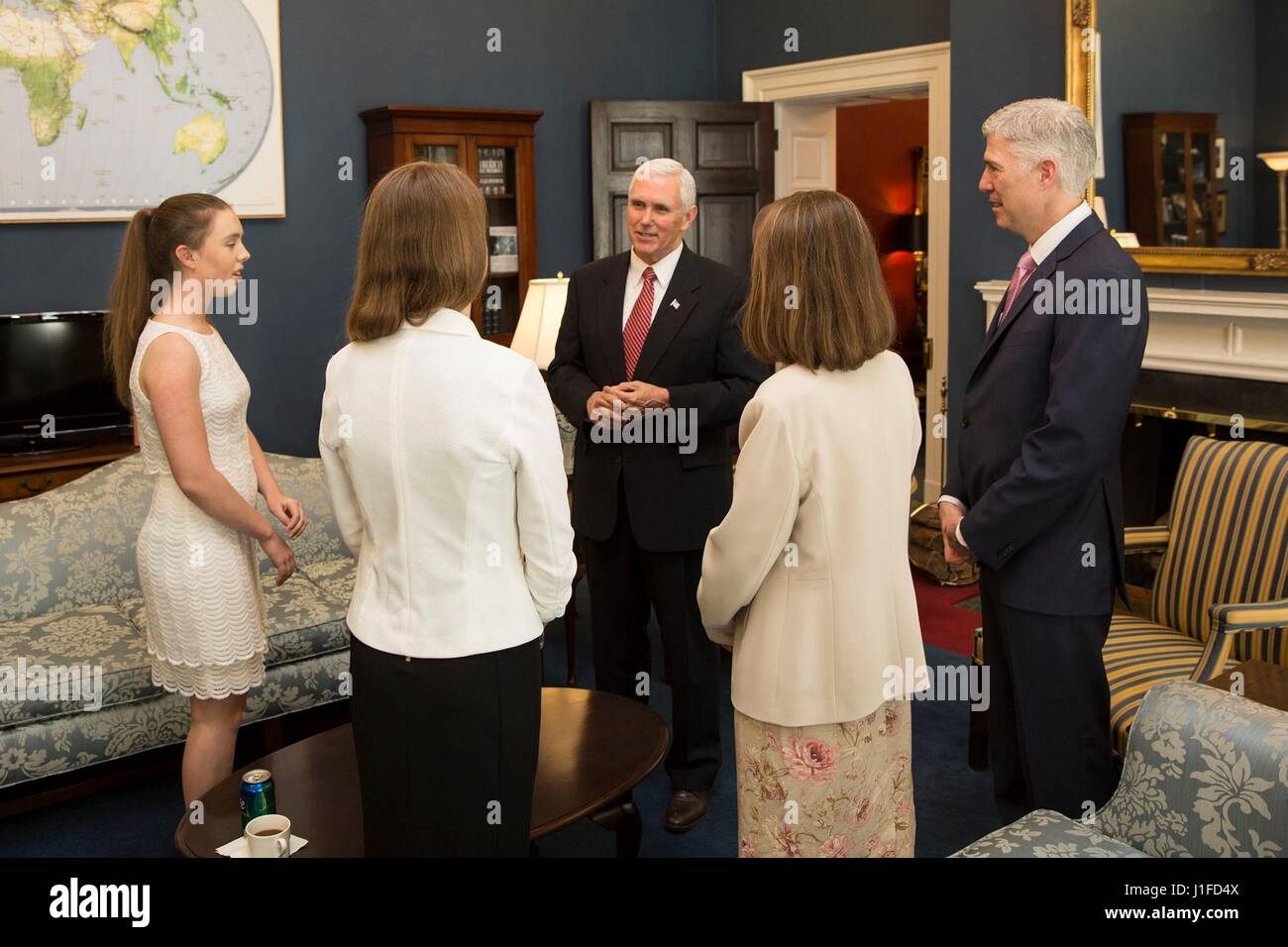 U.S. Vice President Mike Pence, center, meets with Supreme Court nominee Neil Gorsuch, right, and his family  April 10, 2017 in Washington, DC. Stock Photo