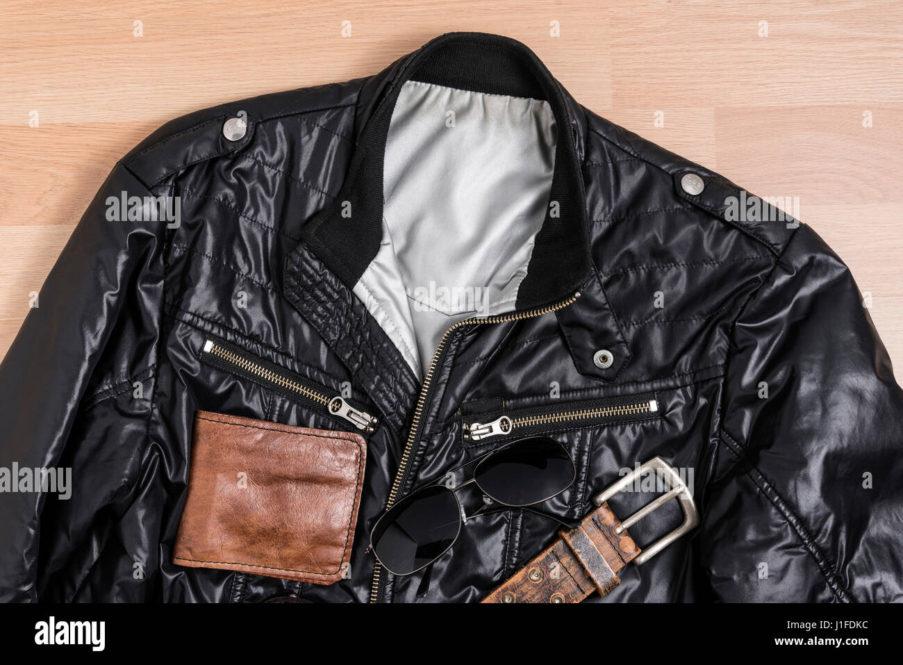 Men casual trendy fashion with Black jacket and accessories on wooden table still life style