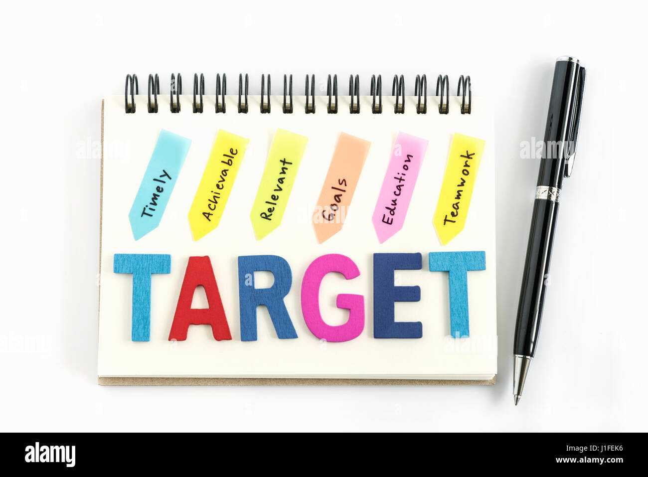 Target Handwritten Words target on the notebook with handwriting timely achievable ...