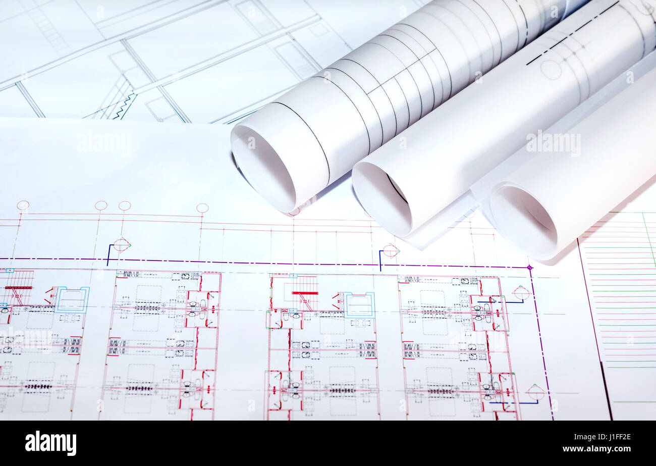 blueprints paper and blueprints rolls, the past of architectural project, construction and renovation concept Stock Photo