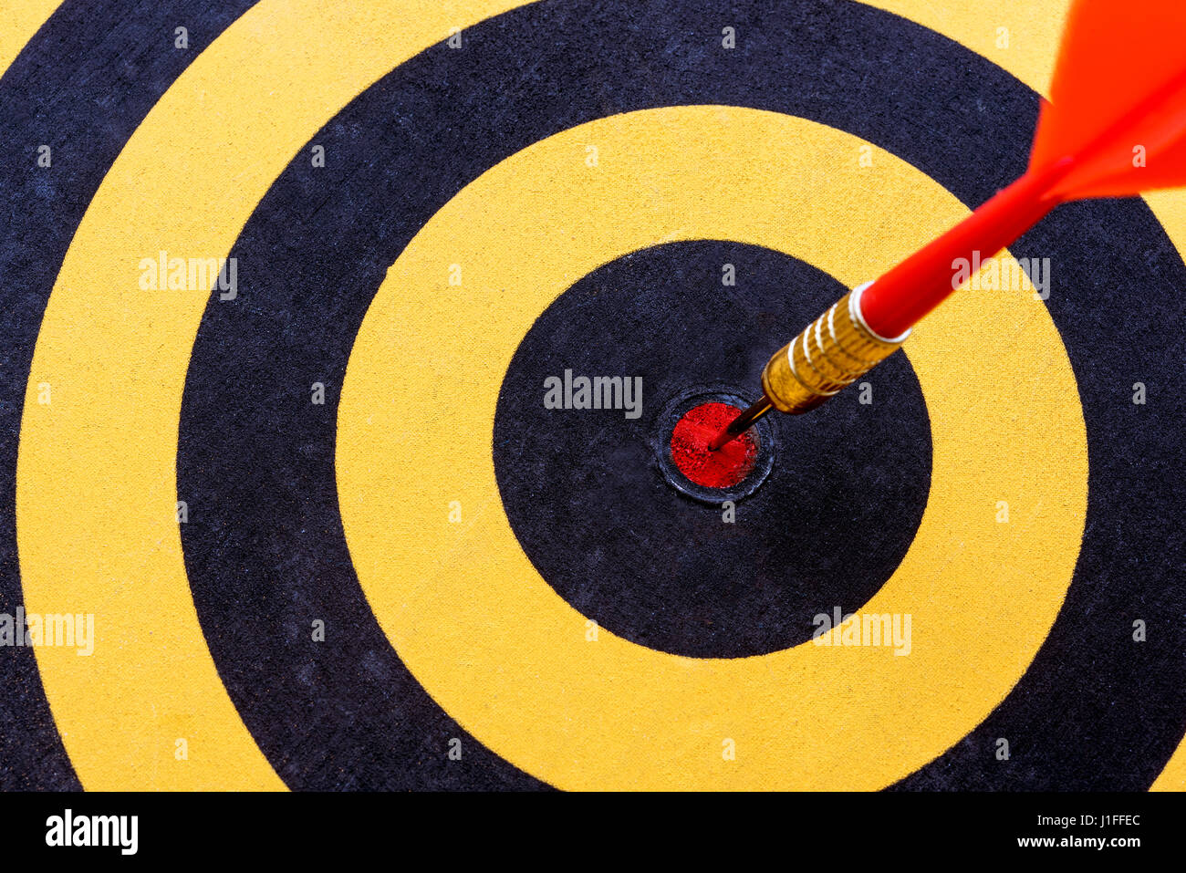 closeup dart target with arrow on bullseye, Goal target success business investment financial strategy concept, abstract background Stock Photo