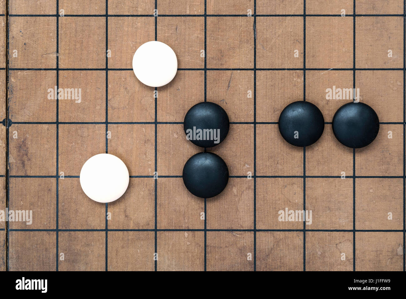 Go game board traditional chinese game. Weiqi game board. Stones on a