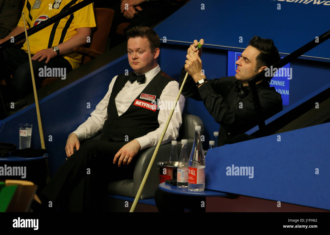 Ronnie O'Sullivan (right) and Shaun Murphy during day six of the
