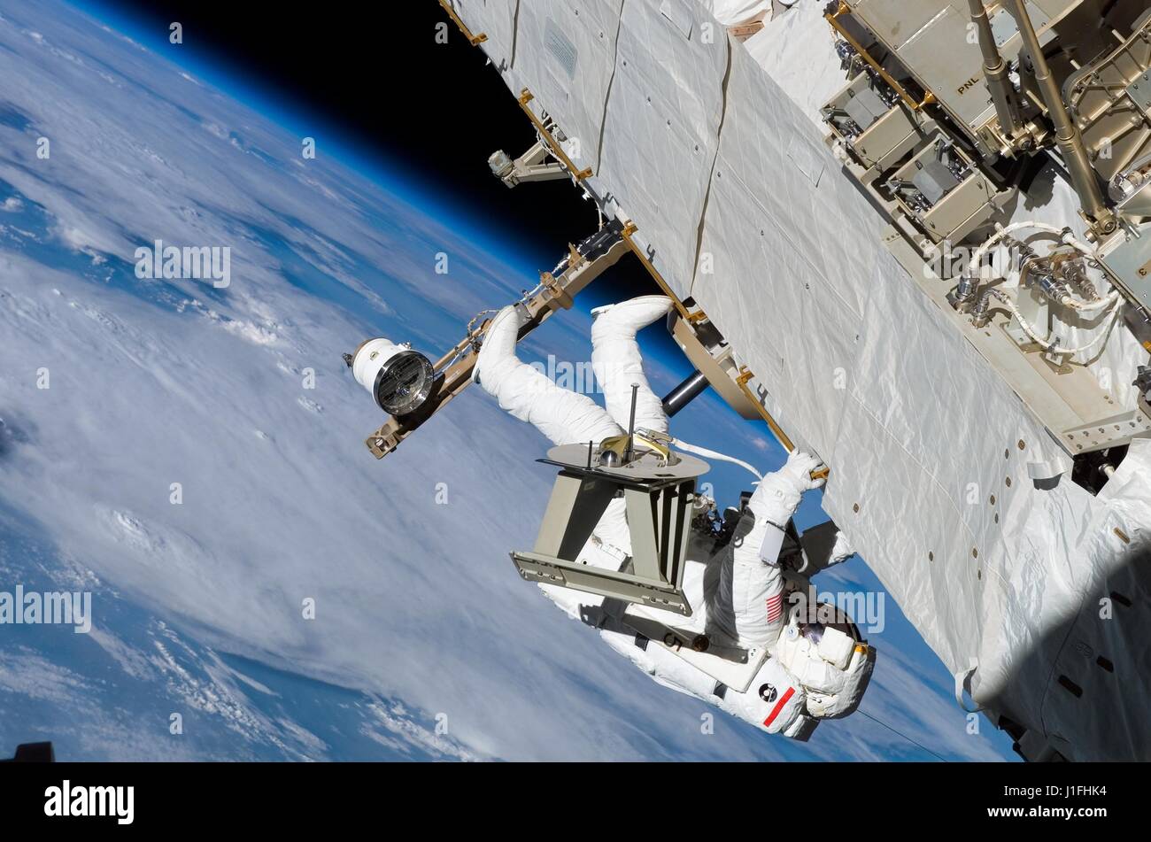 NASA Space Shuttle Discovery International Space Station STS-121 mission prime crew astronaut Piers Sellers installs an ammonia tank inside the ISS S1 Truss during an extravehicular activity spacewalk July 12, 2006 in Earth orbit.      (photo by NASA Photo /NASA   via Planetpix) Stock Photo