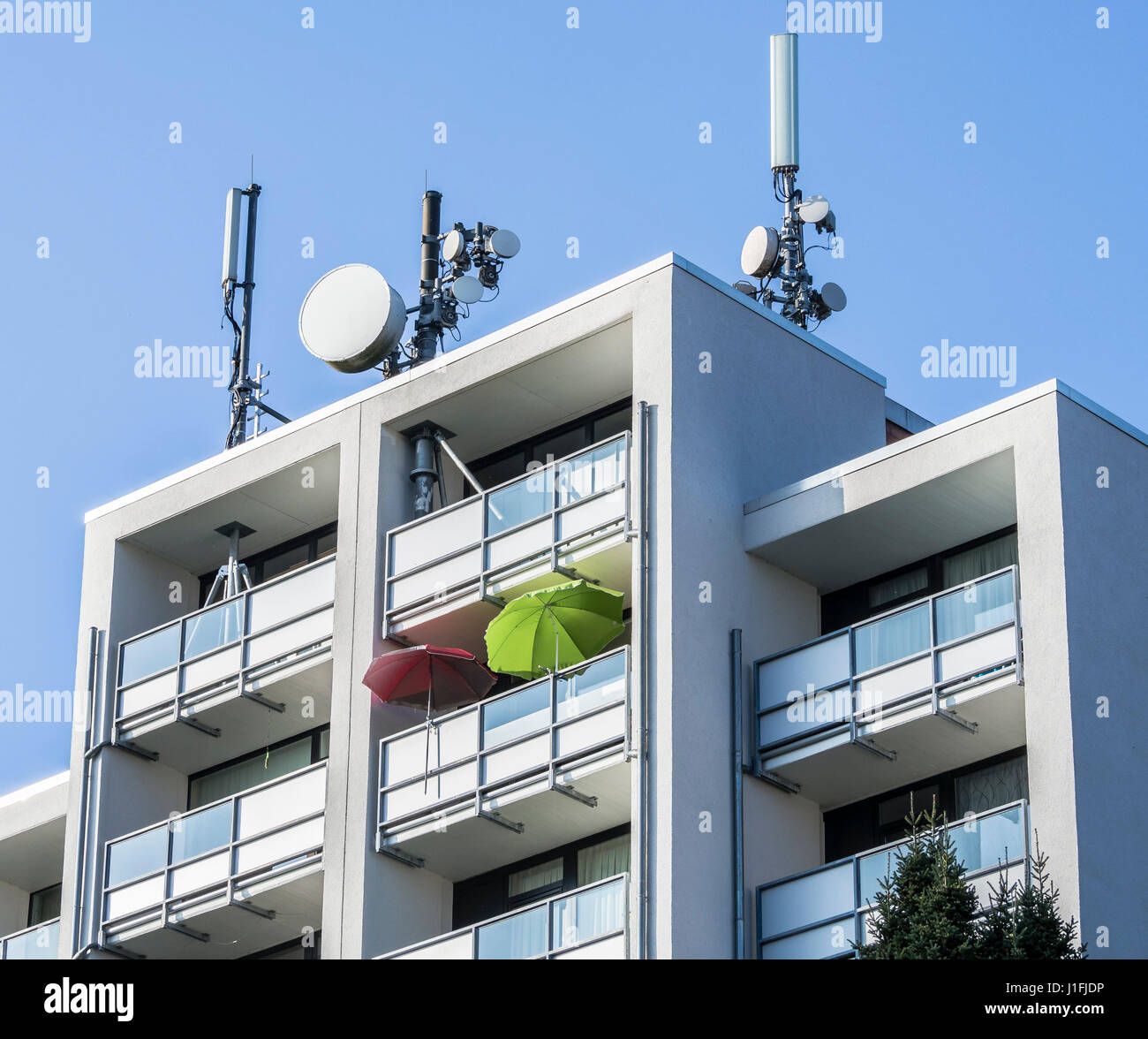 Radio mast, antenna, mobile communication set on top of apartment house