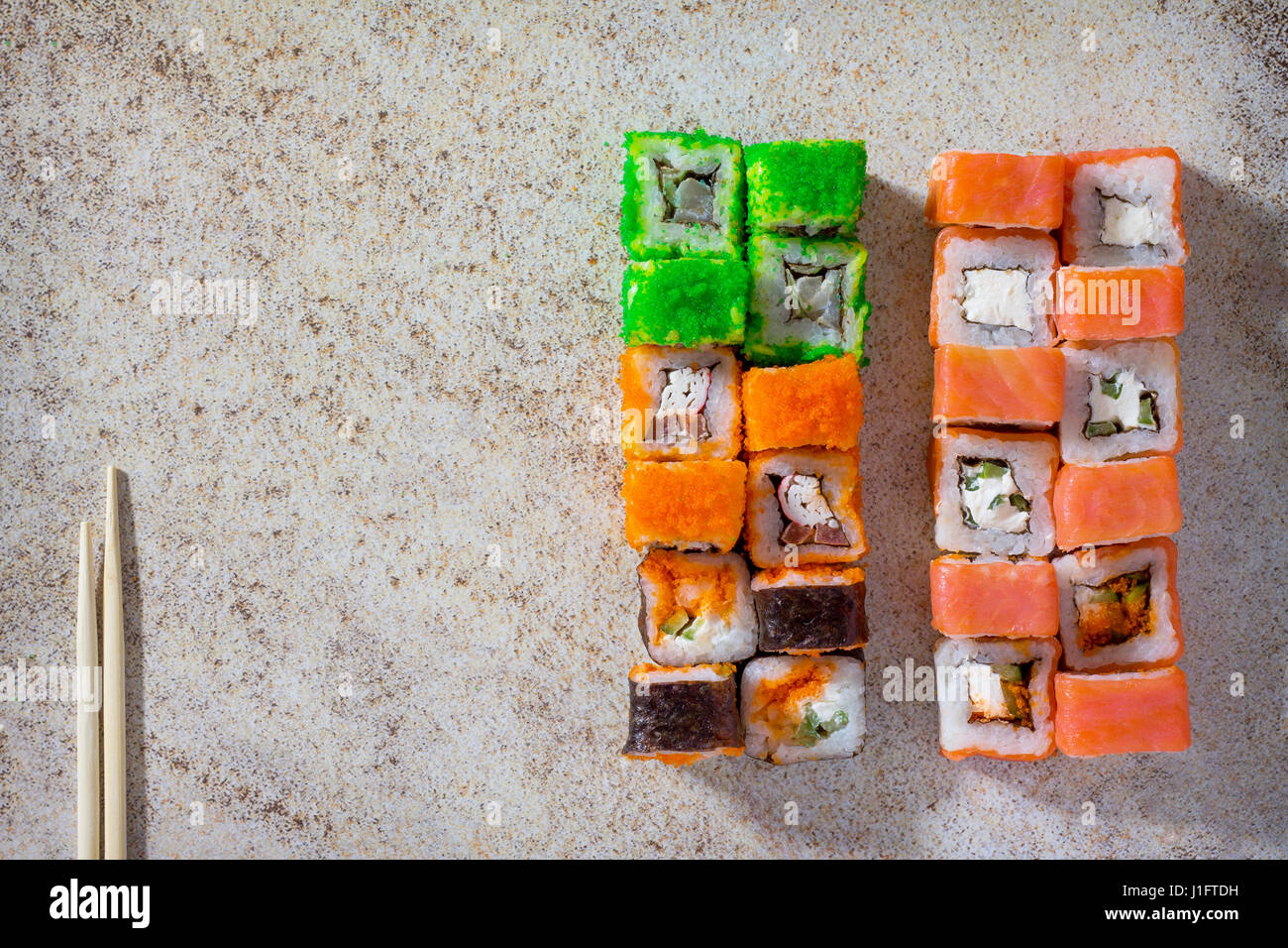 Sushi seth roll - Roll Green mile, Mr.Krabs, Okinawa, Philadelphia classic, roll Cheese salmon and Jamaica. Stock Photo