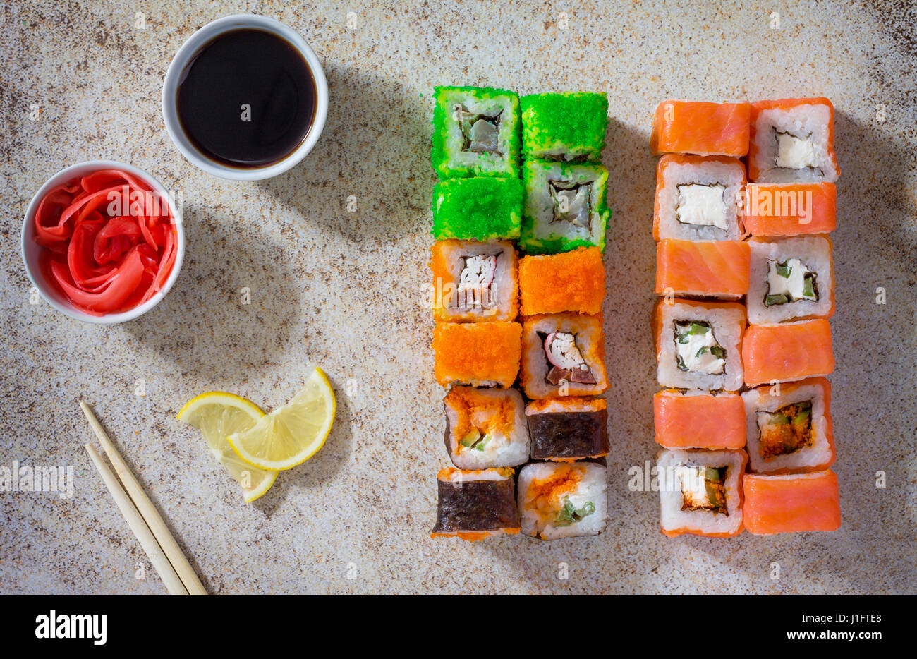 Sushi seth roll - Roll Green mile, Mr.Krabs, Okinawa, Philadelphia classic, roll Cheese salmon and Jamaica. Stock Photo