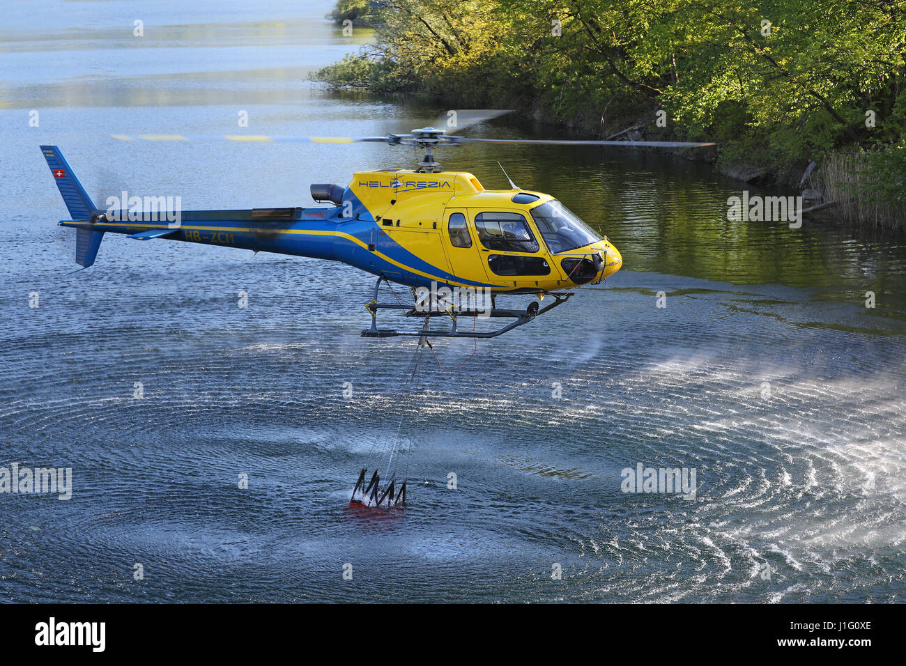 Fire fighting efforts are under way with helicopters to put out forest