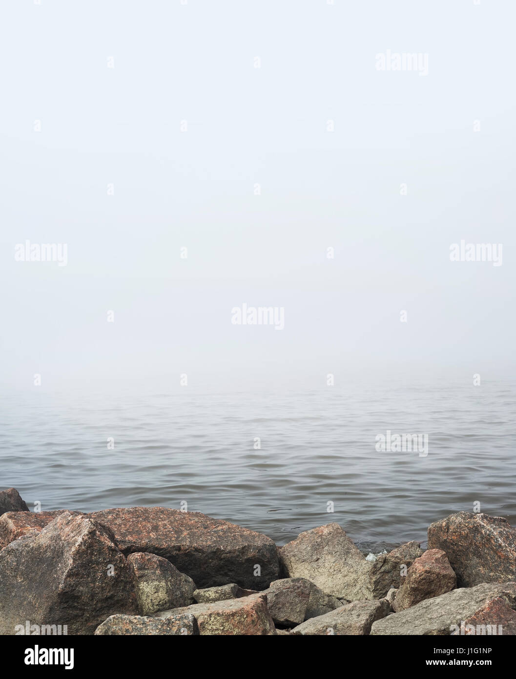 Landscape with fog over the lake Stock Photo - Alamy