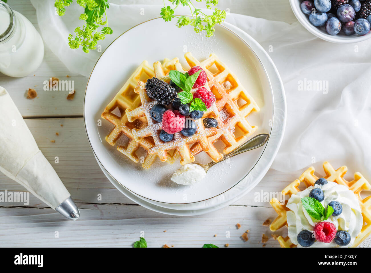 Closeup of homemade berries with waffles and whipped cream Stock Photo ...