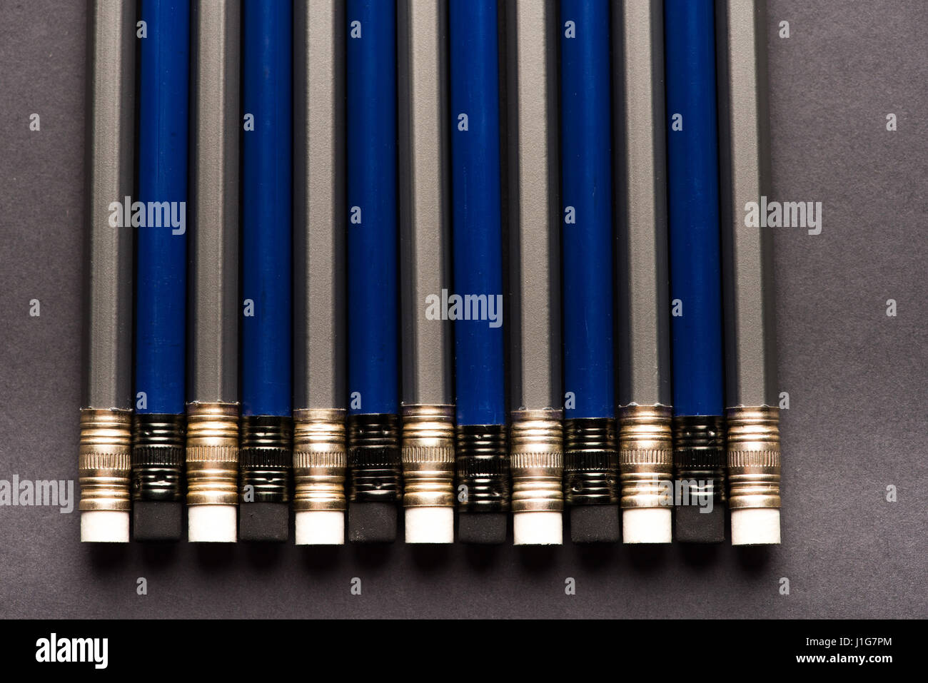 Close-up top view of new lead pencils on black Stock Photo