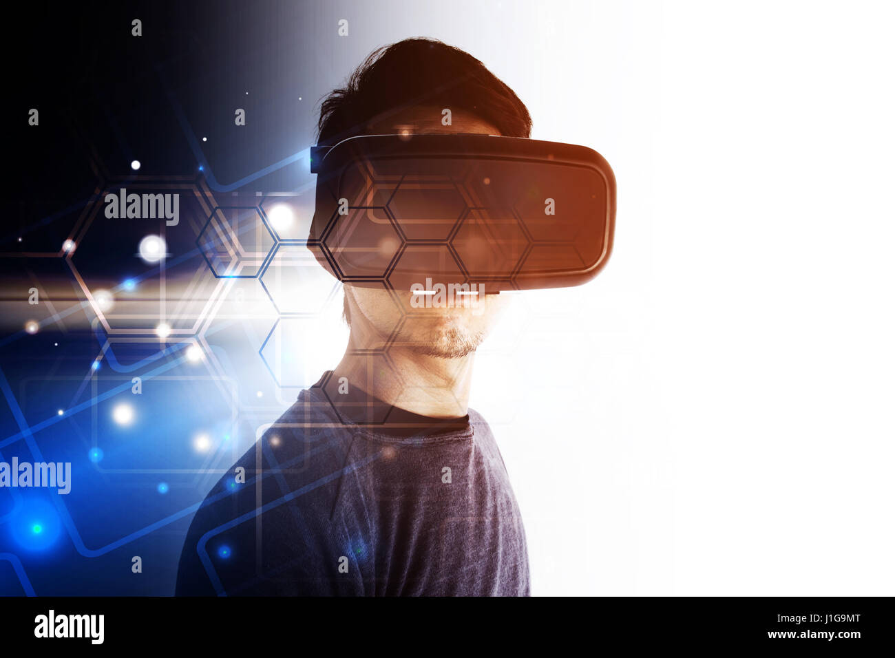 Young businessman wearing virtual reality glasses Stock Photo - Alamy