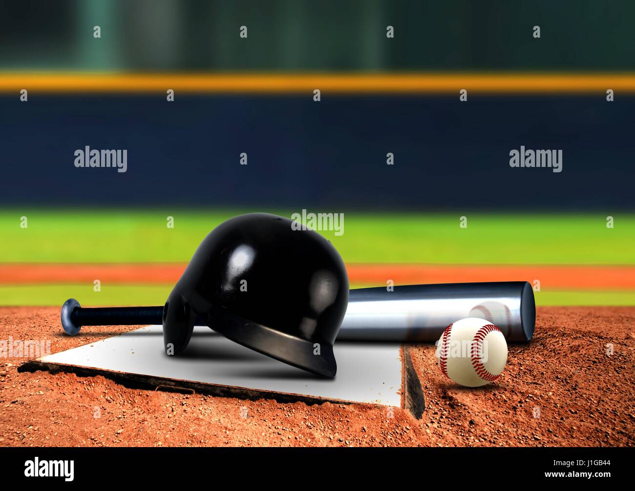 Baseball equipment on base Stock Photo - Alamy