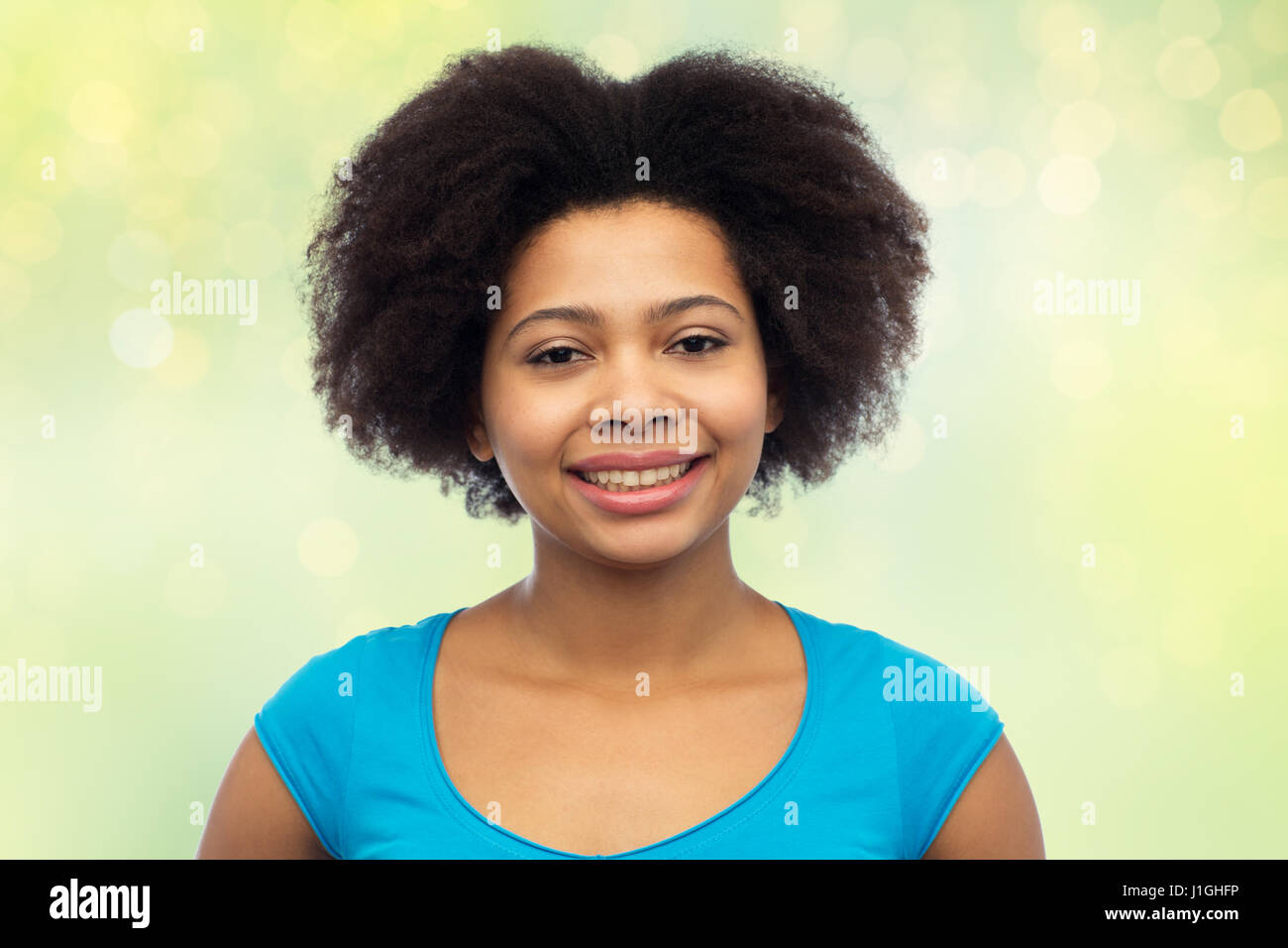 happy african american young woman over white Stock Photo - Alamy