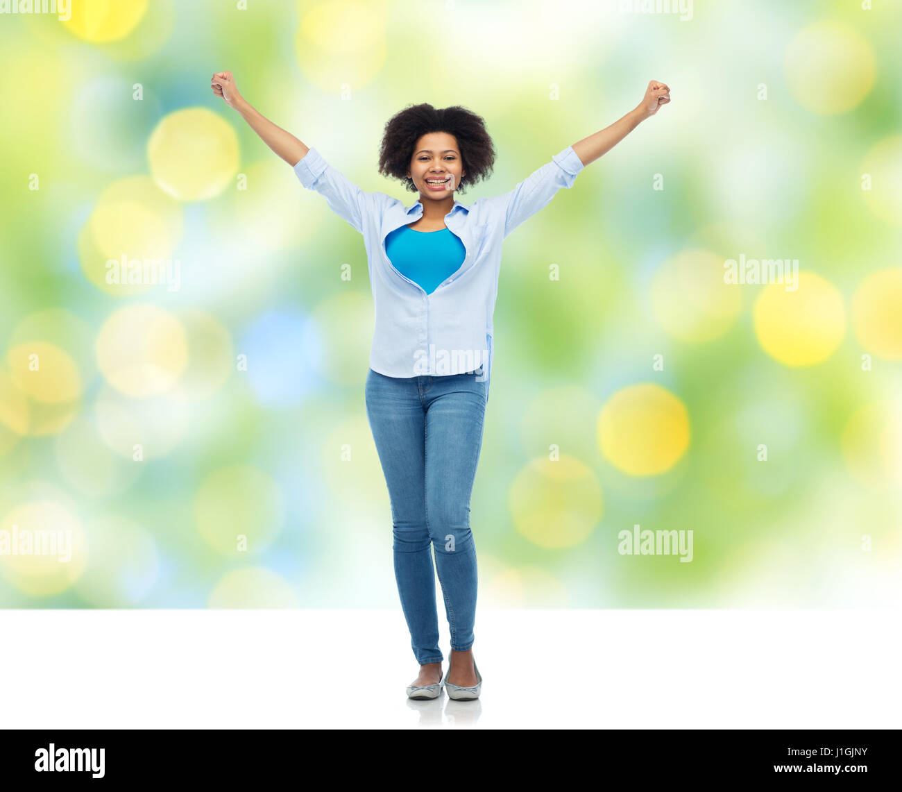 happy african american young woman over white Stock Photo - Alamy