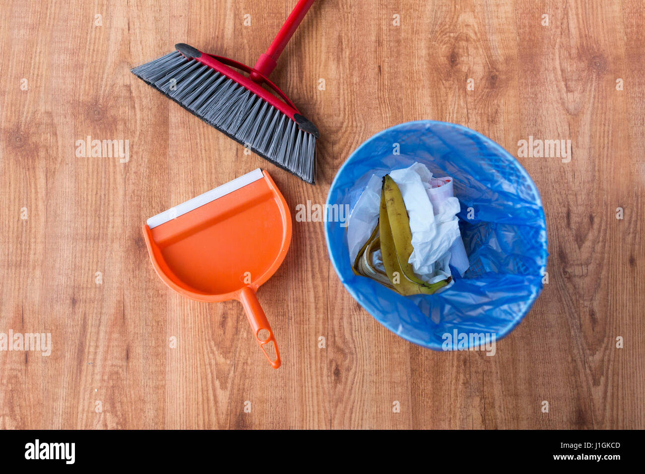 rubbish bag with trash and cleaning items at home Stock Photo - Alamy