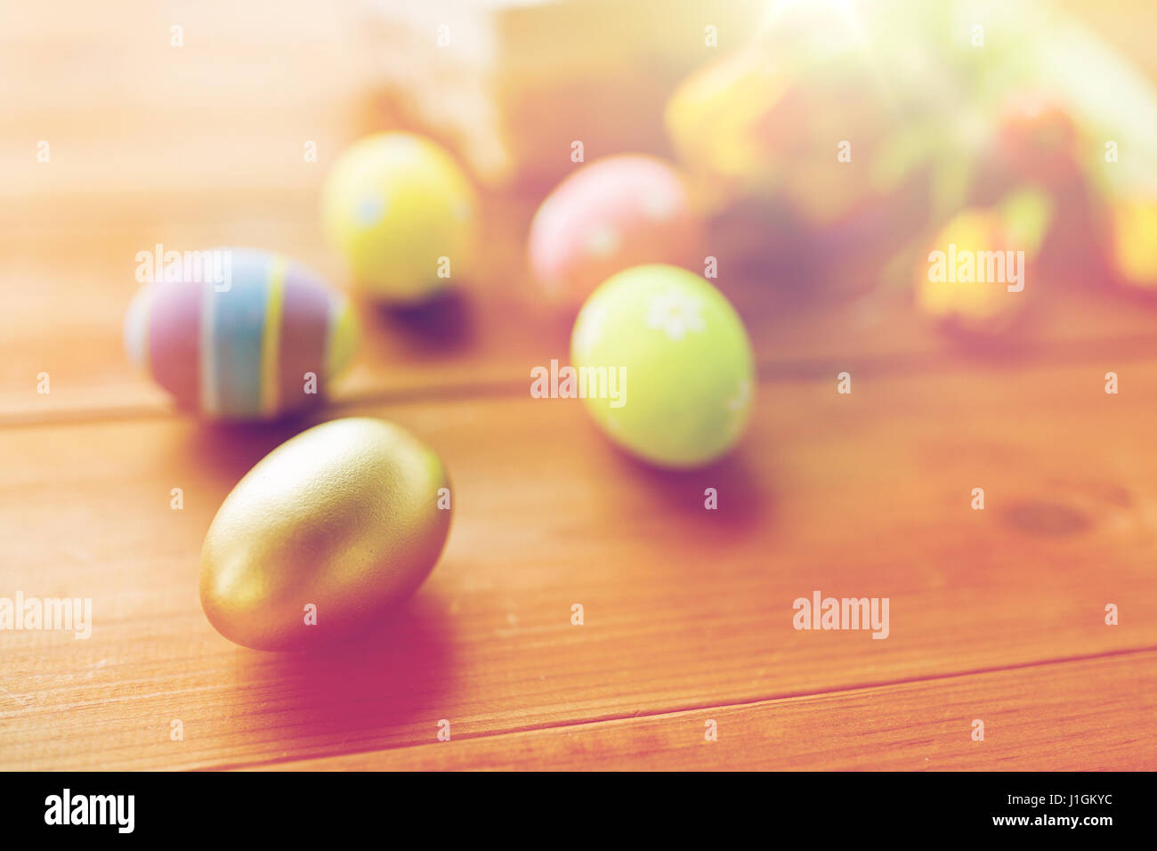 close up of colored easter eggs and flowers Stock Photo