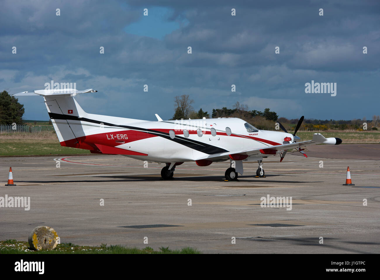 PC12 Single engined Luxumbourg registered Business Aircraft at Inverness Airport, Highland Region. Scotland. Stock Photo