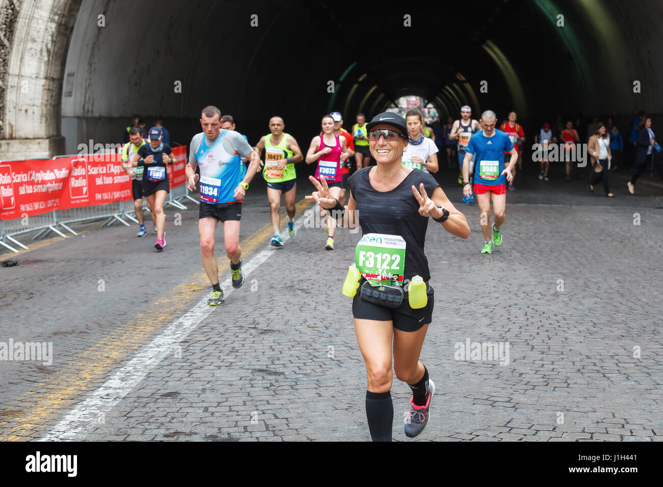 Rome, Italy - April 2nd, 2017: Athletes of the 23rd Rome Marathon to the passage of the tunnel Umberto I, a few kilometers from the finish. Stock Photo