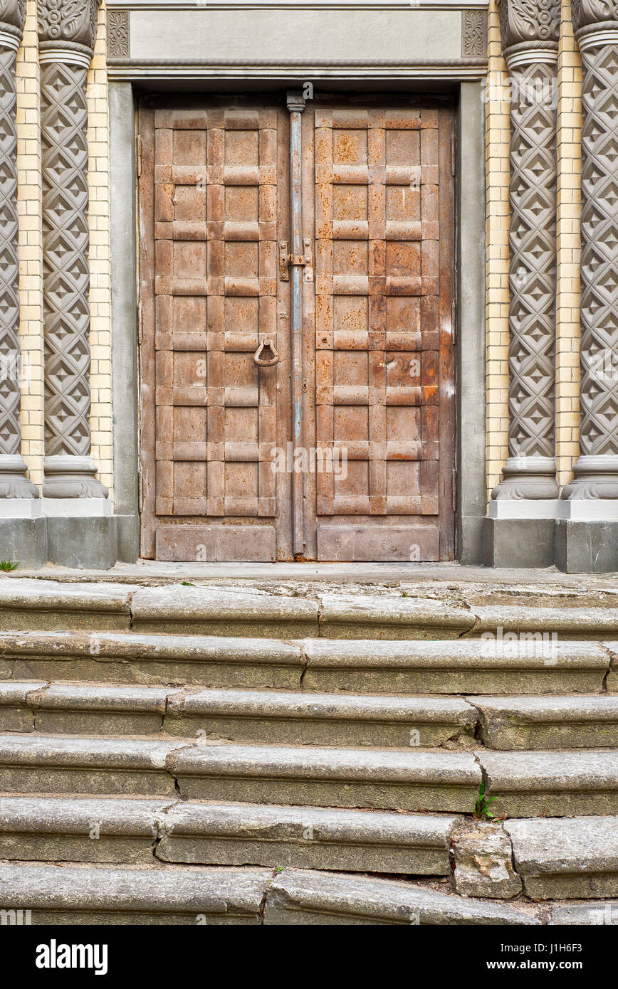 old stairs and door of the church Stock Photo