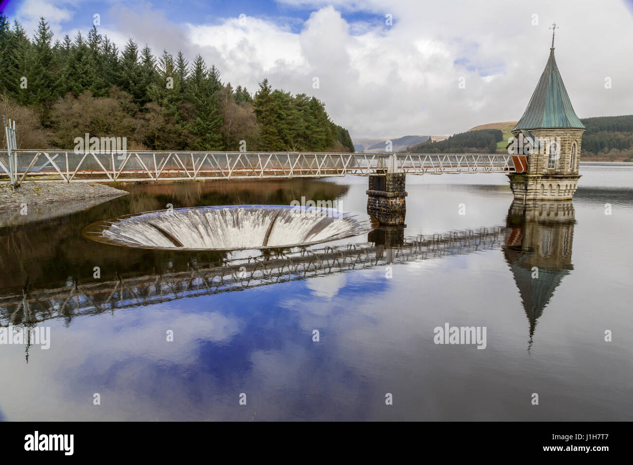 Pontsticill Reservoir showing the bell mouth spillway and valve tower,  Bannau Brycheiniog National Park , Wales,UK Stock Photo