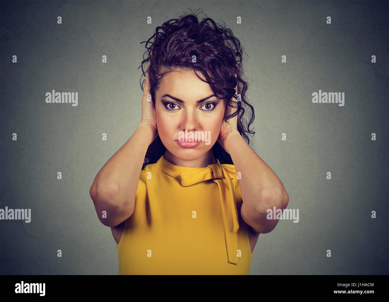 Cover ears noise hires stock photography and images Alamy