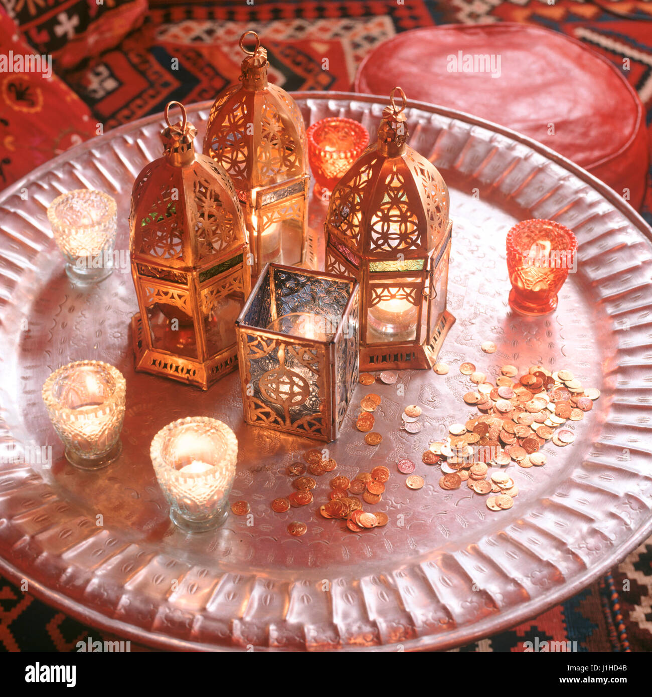 Arabic style lanterns and candles on table Stock Photo - Alamy