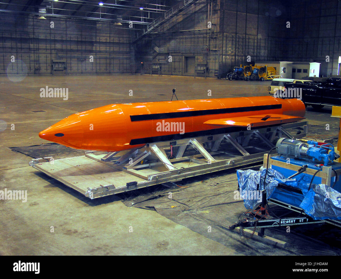 Massive Ordnance Air Blast or MOAB weapon is prepared for testing. MOAB is a precision-guided munition weighing 21,500 pounds. It will be the largest non-nuclear conventional weapon in existence. Stock Photo