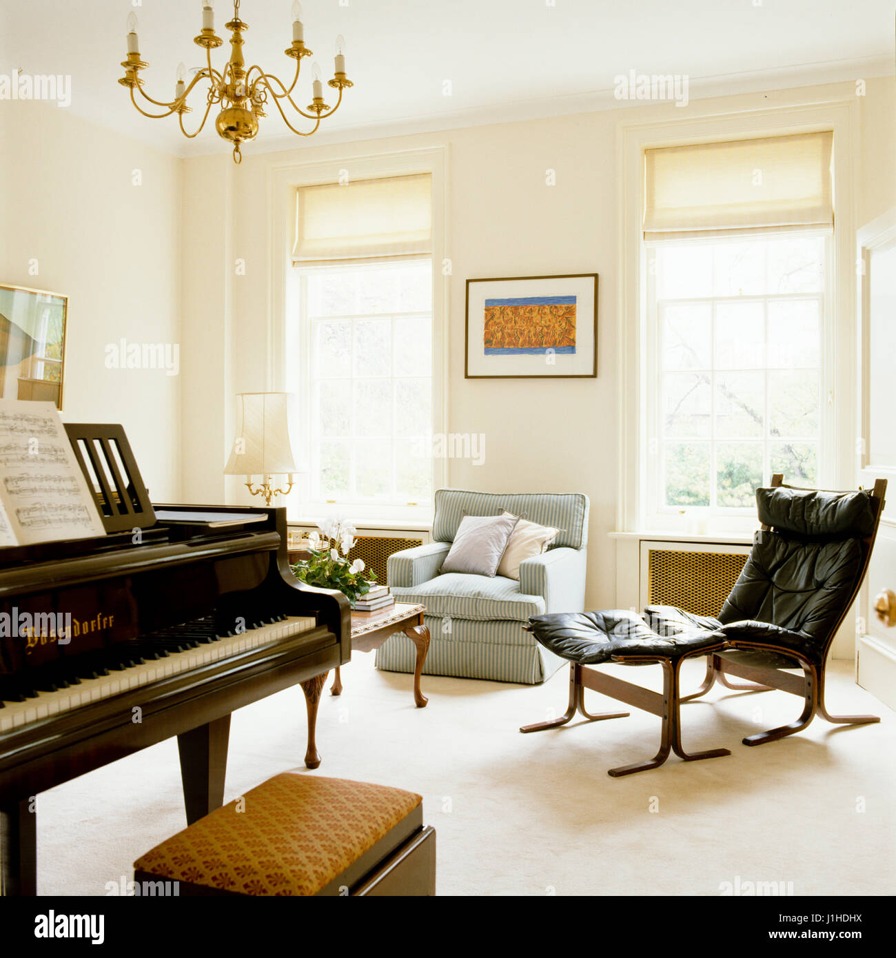 Living room with a piano. Stock Photo