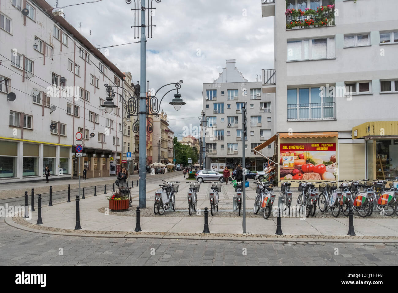 Street scene showing typical apartments and small retail shops, Wroclaw