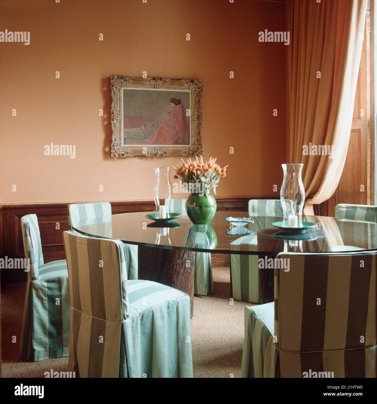 Dining room with striped chairs Stock Photo Alamy
