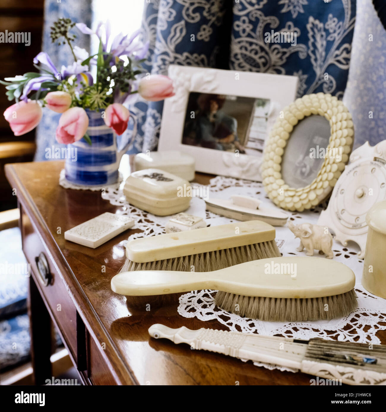 Dressing table with hairbrushes. Stock Photo