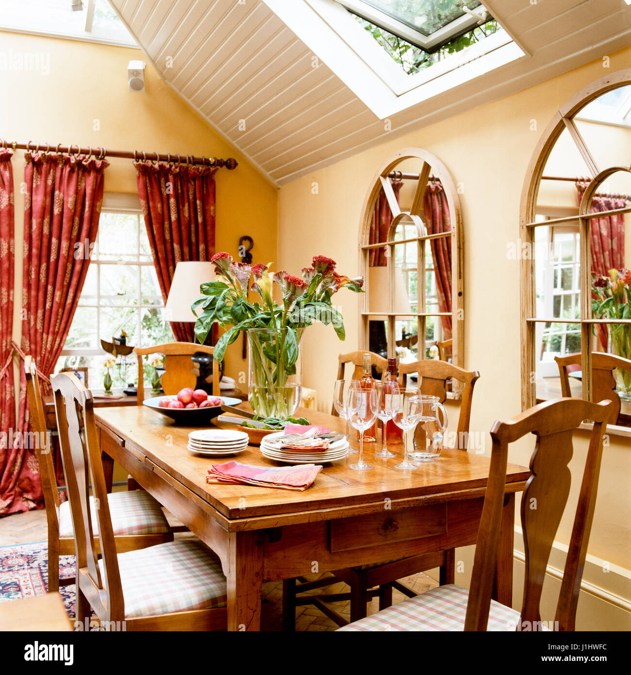 Dining room with skylights Stock Photo - Alamy