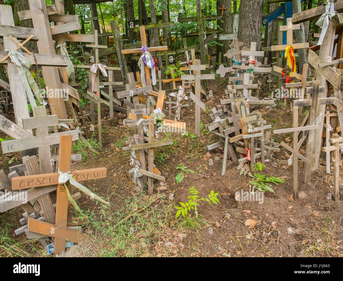 Grabarka, Poland - August 14, 2016: Holly crosses brought by pilgrims to the Holy Mount Grabarka. Stock Photo