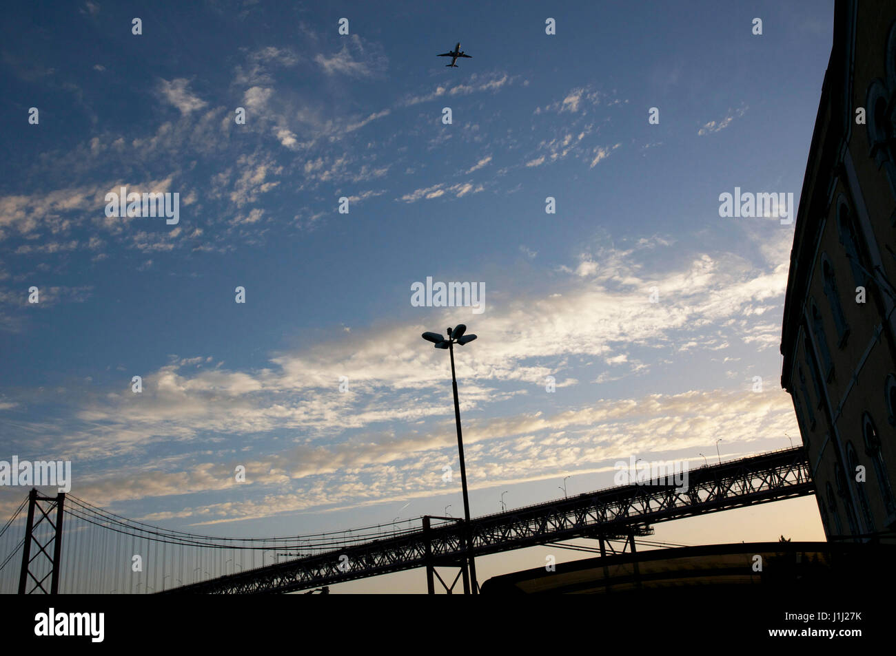 airplane flying over Lisbon Stock Photo