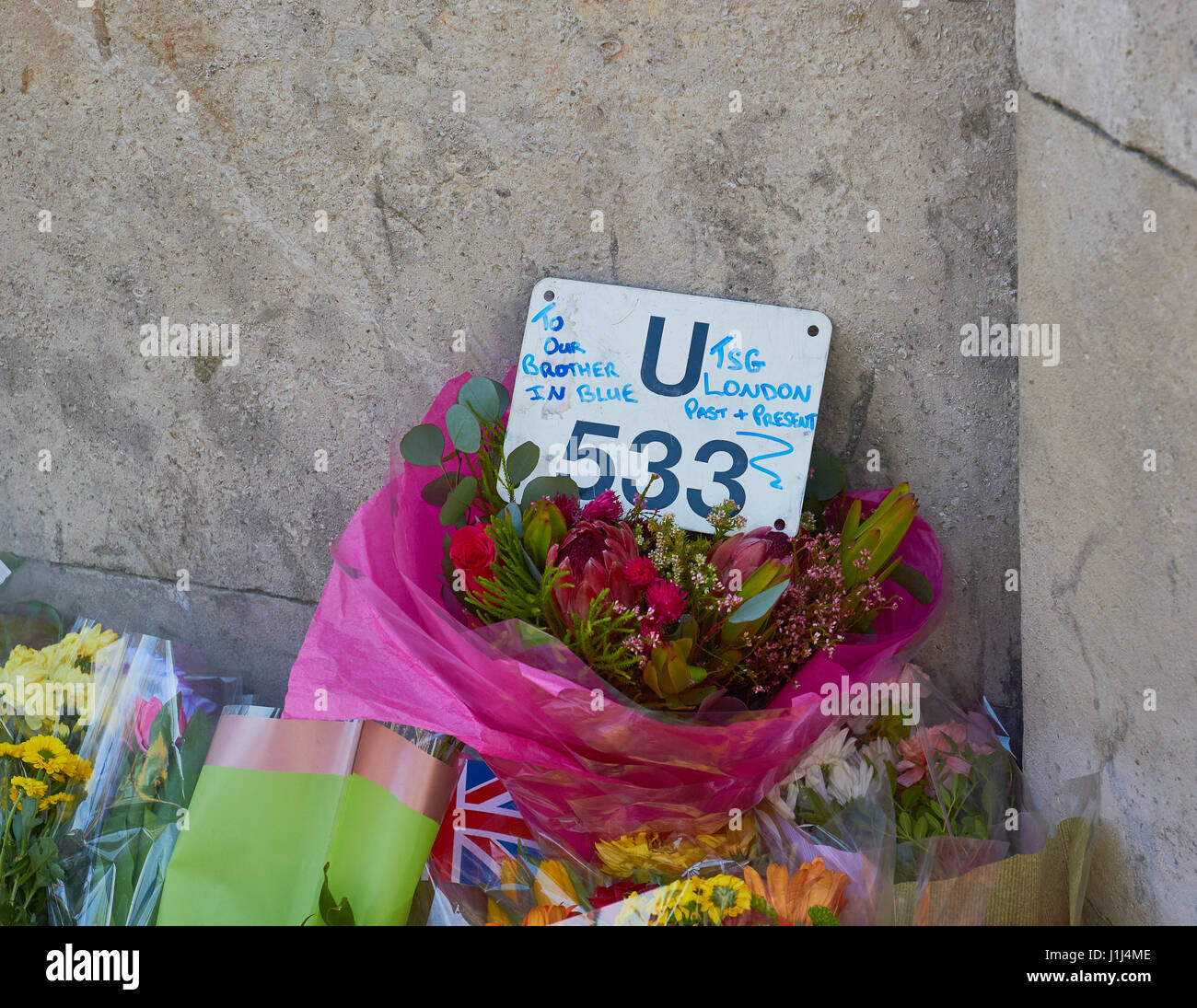 Flowers and tributes to PC Keith Palmer hero and victim in the Westminster terrorist attack, London, England Stock Photo