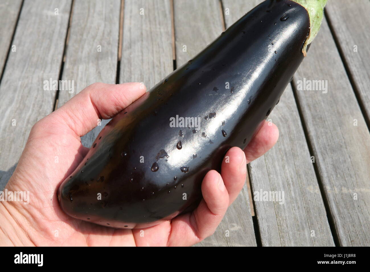 eggplant on wooden table Stock Photo