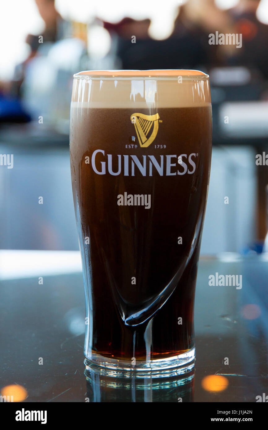 DUBLIN, IRELAND - FEB 15, 2014:  Pint of Guinness, the popular Irish beer Stock Photo